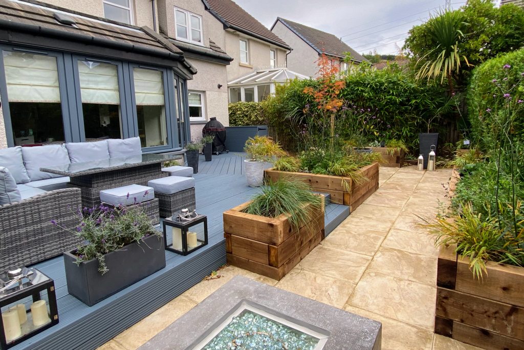 Elevated decking with cosey fire pit.