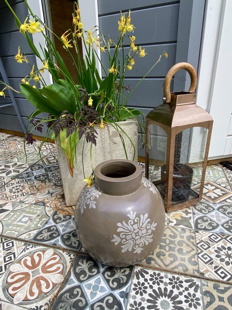 Decorative accents on patterned tiles.