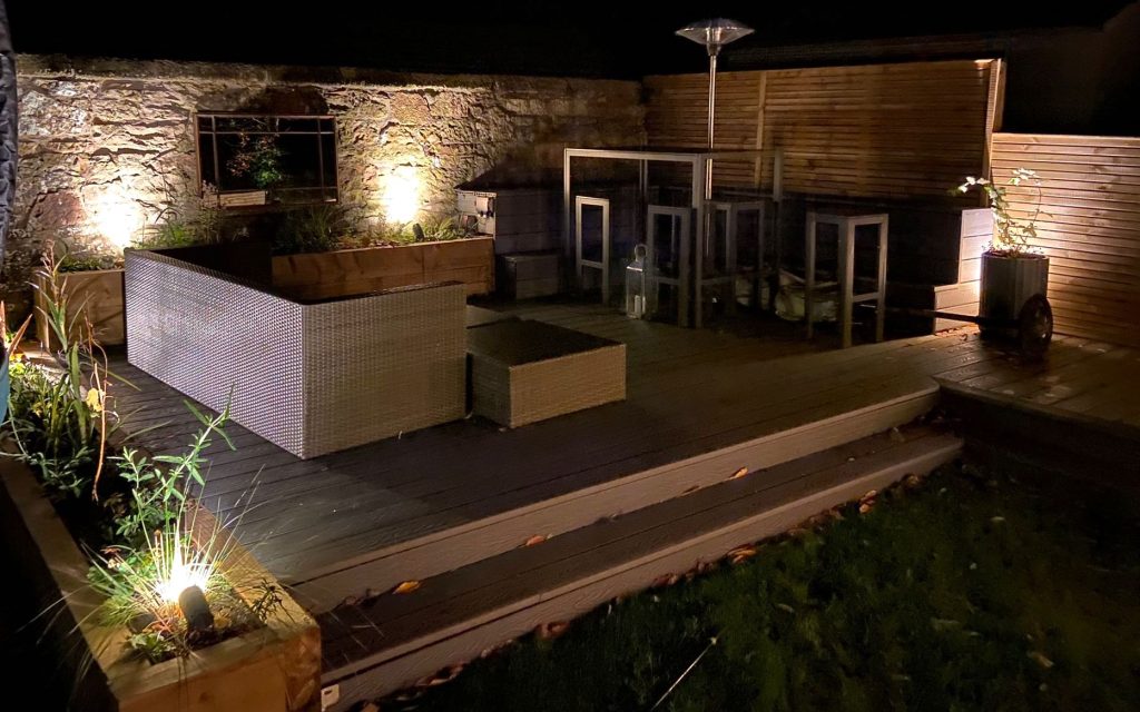 Ambient nighttime lighting for a cosey outdoor patio experience.